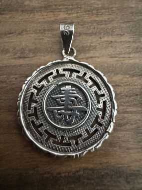 Sterling Silver Medallion Pendant featuring the tradition Chinese character SHOW